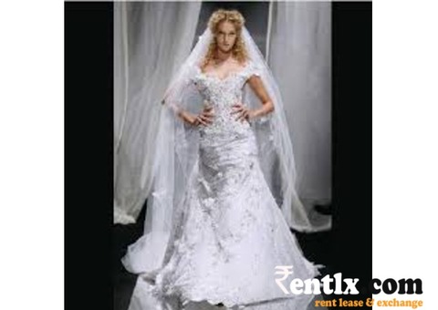 CHRISTIAN WEDDING GOWNS FOR RENT- Elshaddai Christian Wedding Planners